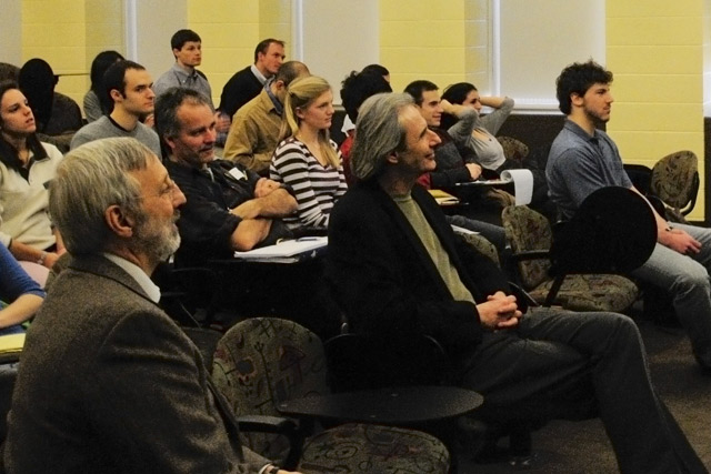 At left, David Bodznick, dean of Natural Sciences and Mathematics, professor of neuroscience and behavior, professor of biology, and John Kirn, professor and chair of the Neuroscience and Behavior Program, director of graduate studies, professor of biology, enjoy the alumni presentations. Bodznick and Kirn encouraged undergraduates to participate in the symposium. 