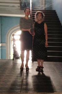 Rachel Trousdale and Priscilla Meyer stand on the landing of the Nabokov Museum at 47 Bol'shaya Morskaya Street in St. Petersburg. 