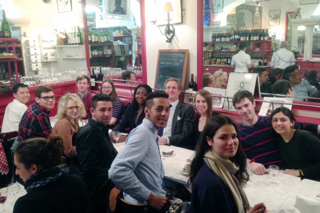 Several Wesleyan students attended a dinner in Paris, hosted by Wesleyan alumnus James Lieber ’84. Pictured, from left, are Robert Don ’15, Laura Hess ’16, Olayinka Lawal ’15, James Lieber ’84, Haylle Reidy ’15, Will Slap ’15 and Drue Mirchand ’15. In the booth are Borworn Satayopas ’15, Dan Medvedev ’16, Gabriella Carpenter ’16, Daniel Issroff ’15, Michael Lyn ’15 and Stephanie Dawson ’16. 