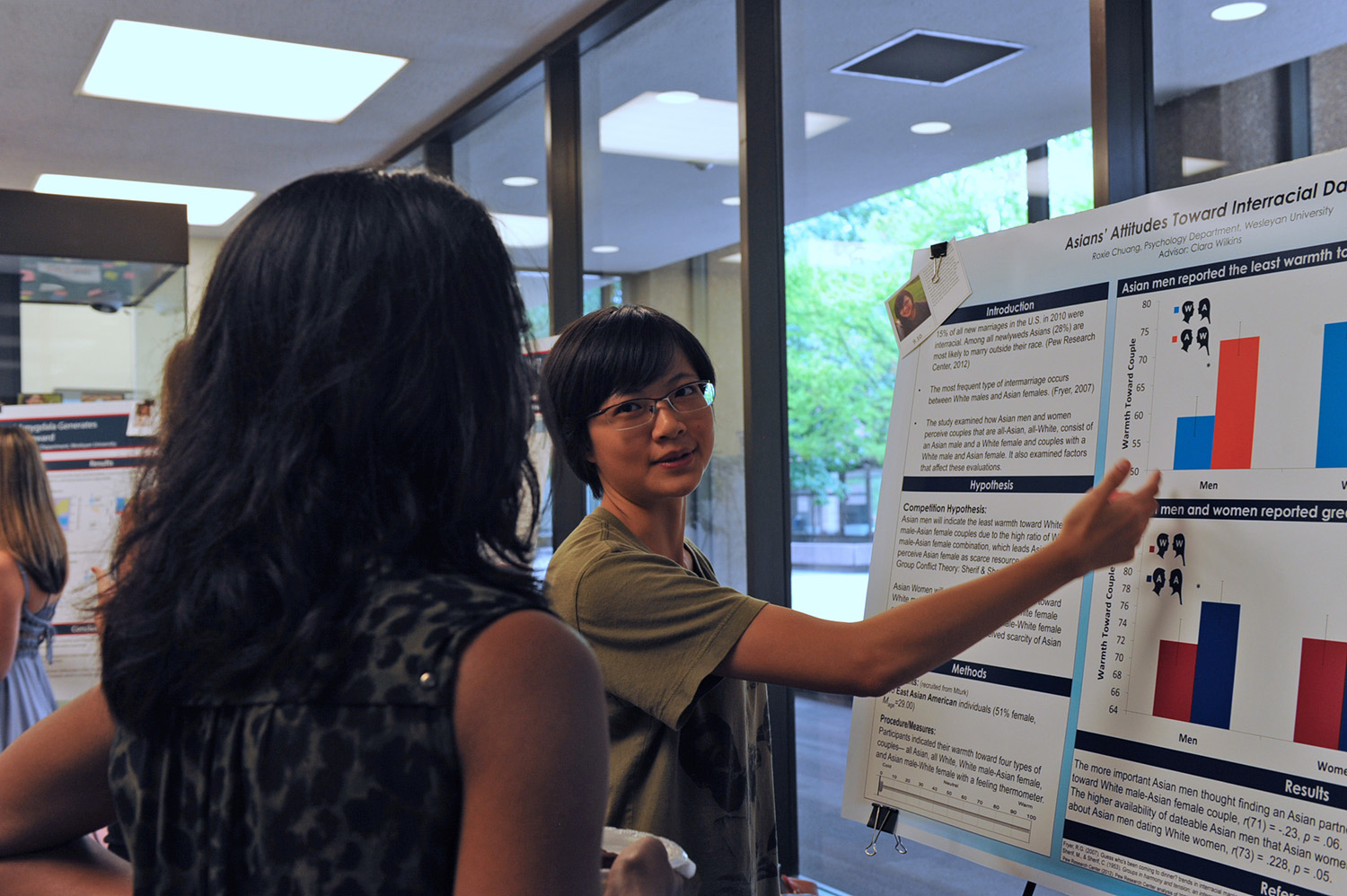 Roxie Chuang 17 highlights an important point in her postor, Asians Attitudes Toward Interracial Dating. Clara Wilkins, assistant professor of psychology, is Chuang's advisor.