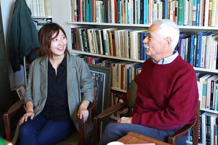  Professor Richie Adelstein, who teaches Order and Planning in Economic Thought at the Cheshire C.I., discusses the recent round of essays with his Teaching Assistant, Haenah Kwon '16. Kwon began her involvement with the Center for Prison Education last fall when she worked as a research intern. (Photo by Hannah Norman '16)