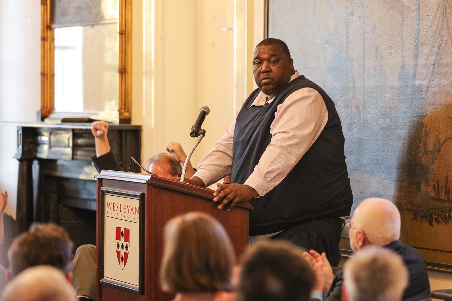 William Juneboy Outlaw III, Barber's collaborator and the subject of his book, spoke movingly about his transformation. Today, he uses his lived experience as a former felon and gang leader as a cautionary tale to warn young people in New Haven about the consequences of the criminal life.