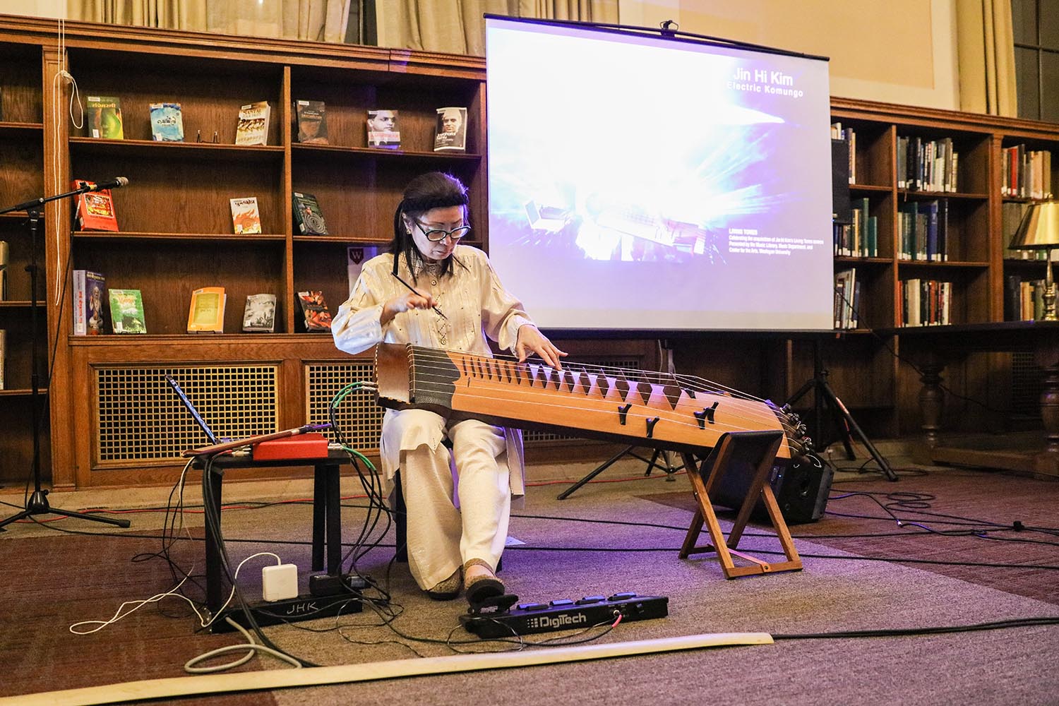 in Hi Kim discussed the compositional concept of Living Tones and presented a performance on the electric komungo (Korean stringed instrument).