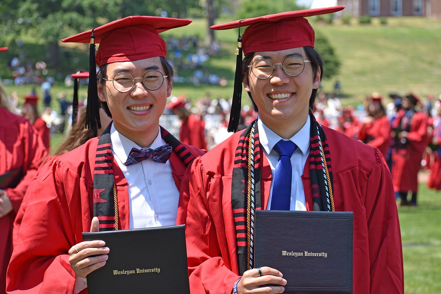 Twin brothers Jake Kwon '21 and Jack Kwon '21 celebrate their graduation ceremony.  (Photo by Tom Dzimian)