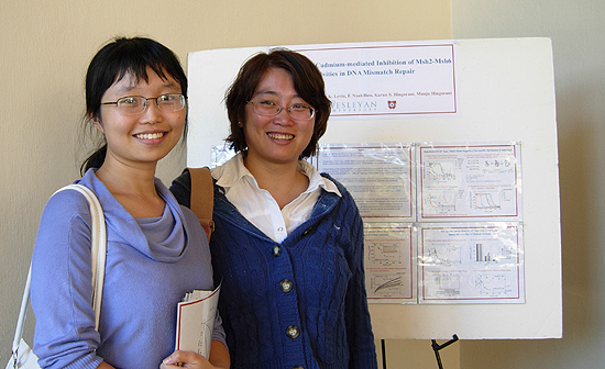Molecular biology and biochemistry graduate students Yayan Zhou and Jie Zhai present their research at a poster session during the day-long retreat. More than 30 undergraduates, graduate students and post-doc researchers participated in a poster session. Zhou and Zhai work with Manju Hingorani, associate professor of molecular biology and biochemistry. 