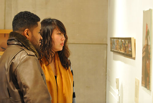 Sara'o Bery '09 and Mimi Bai '09 browse the gallery's collection. 