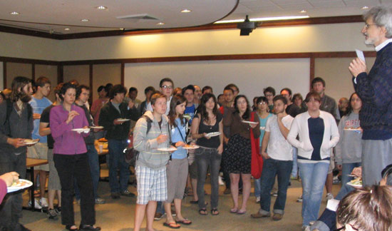 Michael Weir, director of the Hughes Program in the Life Sciences, professor of biology, speaks to students at the 21st Hughes Summer Research Program pizza party May 27.