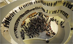 Neely Bruce, at bottom of photo, conducts "Orbits" inside the Guggenheim Museum. The event was featured in the New York Times. (Photo by Robert Stolarik for the New York Times)