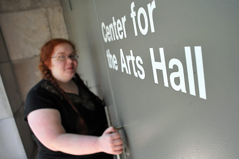 Elizabeth Goldgar '11 enters the new Center for the Arts Hall on Aug. 14. Formerly called the cinema, the CFA Hall is one of several performance and exhibition spaces on the Wesleyan campus.