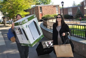 Robert Vance '13 of Burmingham, Ala., and his mother, Joyce White Vance, move Robert's belongings into his Butterfield Residence Hall room. The dorm-size regrigerator was an early birthday present from Robert's grandmother.