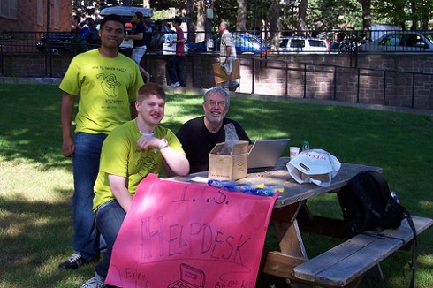 Ryan Gee ‘11, Sam Lyons, and Jim Degolia P ‘13 man an ITS Help Desk outside the Butterfield Residence Halls.