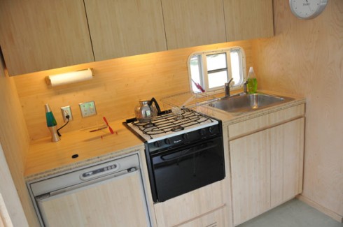 The fully-operational kitchen is made of bamboo cabinetry. 