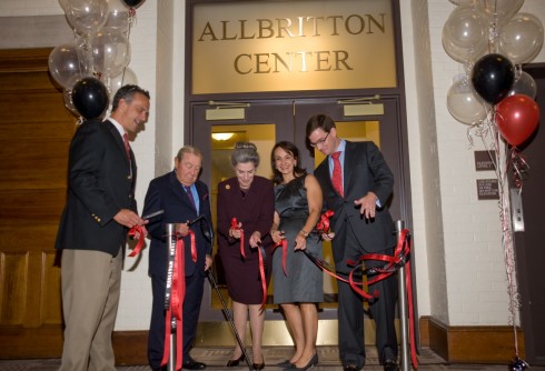 Wesleyan President Michael Roth '78, WHO, WHO, Elena Allbritton ’93 and Robert Allbritton ’92 take part in a Allbritton Center ribbon-cutting ceremony Oct. 2. The U.S. Green Building Council awarded the Allbritton Center renovation its highly-prized Gold LEED Certification. (Photo by Bill Burkhart)