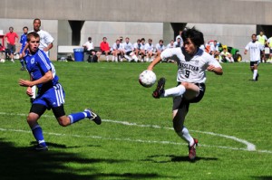 Keisuke Yamashita '10 goes for a goal against Colby College.