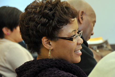 AFCA member Tracey Stanley, administrative assistant in the Registrar's Office, listens during the recent AFCA meeting. In the background, at right, is Ronnie Bowman, journeyman electrician. 