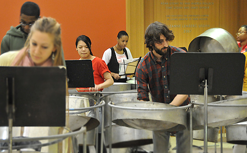 The steel pan (or steel drum) is composed of from one to nine 55-gallon steel barrel drums, suspended with stands.
