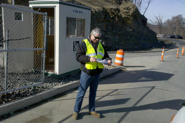 Campus Community Emergency Response Team member Bill Nelligan records the names of personnel accessing the Kleen Energy power plant in Middletown following the deadly explosion Feb. 7. The C-CERT group volunteered almost 100 hours of time. 