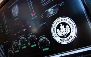 A dashboard, mounted in the Allbritton Center, compares energy use to other spaces on campus. 