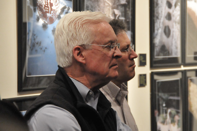 From left, John Driscoll, alumni director, and Paul DiSanto, director of leadership giving, listen to Dowdey speak about his photographs of the garden. For 15 years, the Freeman Family Garden and Tatami Room have lent the homely, friendly air of a Japanese home to the Center for East Asian Studies.