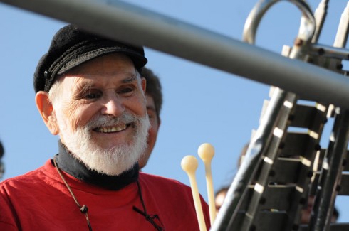 Peter Frenzel, professor of German studies, emeritus, and visiting professor of letters, plays the glockenspiel with the pep band during the game.  