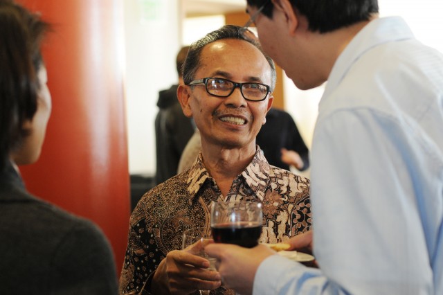 Sumarsam, University Professor of Music, mingles with graduate students at the reception.