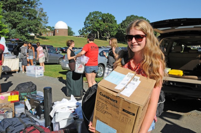 Savannah Benis '16 of San Diego, Calif. unloads her belongings during New Student Arrival Day Aug. 29. Benis, who is planning to major in film studies, is living in Clark Hall. "I'm so excited, but nervous," she says. 