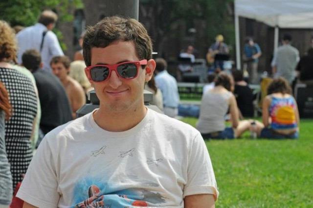 Gabriel Rosenberg '16 soaks in the sun at a mid-day campus concert on Sept. 7.