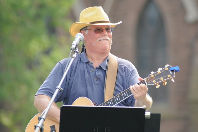 Professor Barry Chernoff, director of the College of the Environment and chair of the Environmental Studies Program, plays guitar. 