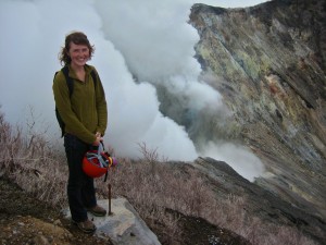 Audrey Haynes '12 stands on the rim of the Turrialba volcano in Costa Rica. When she tested samples of human hair from 53 residents in the area, she discovered high levels of mercury in more than half of the samples.