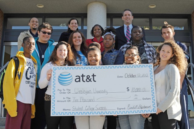 High school students assisted by the Wesleyan's Program for Student College Success gathered on the steps of Usdan University Center Oct. 12 where they received a visit from State Senator Paul Doyle and AT&T Connecticut representative Abby Jewett.