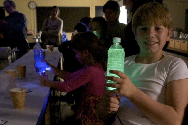 Young scientist Noel shows off a lava lamp he made during Science Saturday.
