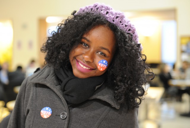 Ibironke Otusile '15 dons two "vote" stickers during Election Day Nov. 6. 
