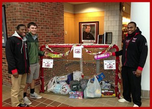 Wesleyan student-athletes gathered gifts for local school children at "Stuff the Nets" Dec. 8.