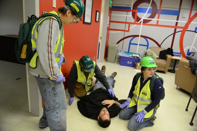 C-CERT trainees practice triage in Usdan's activities room. 