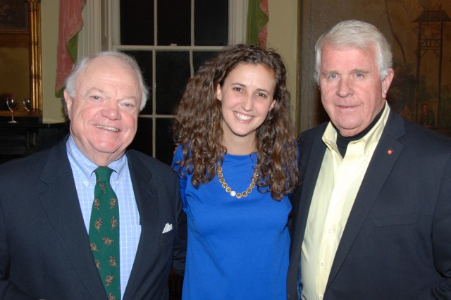 Alexis Sturdy mingles with celebration guests Bud Feeney and John Santa. Santa is chairman of the Sovereign Military Order of Malta Prison Volunteers of Connecticut.