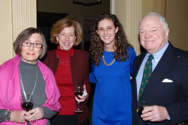Alexis Sturdy visits with guests, from left, Elizabeth Feeney, Cindy Russo and Bernard Feeney. 