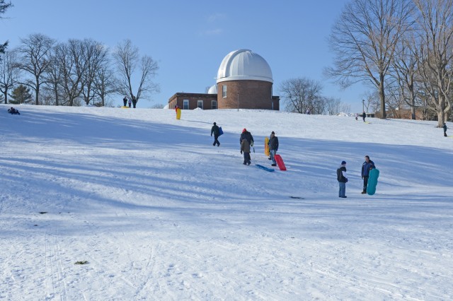 Local community members enjoy an afternoon of sledding on Foss Hill, Jan. 4. 