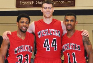 Basketball players, from left, Derick Beresford, Mike Callaghan and Shasha Brown celebrated their 1,000 point this year. 