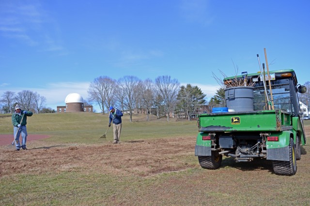 In preparation for the baseball team’s first home game, the Wesleyan grounds crew raked and cleaned up a portion of Andrus Field and Dresser Diamond on March 15. 