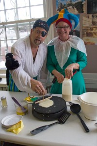 Kristine Schiavi, administrative assistant, and her husband Victor make crepes. (Photos by Hannah Norman '16)