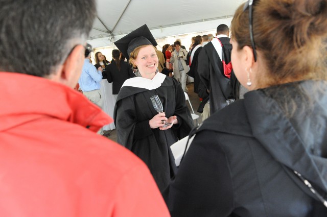 Wesleyan awarded 30 Master of Arts in Liberal Studies degrees. GLS graduates and guests received their diplomas and glasses of champagne in a reception at the Davidson Art Center on May 26. (Photo by Nick Lacy)