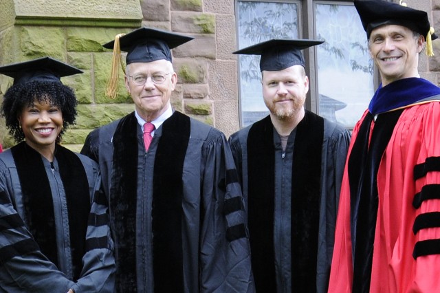 Wesleyan President Michael Roth, at right,  awarded Majora Carter ’88, Jim Dresser ’63 and Joss Whedon ’87 with honorary degrees.