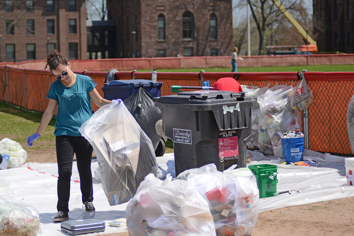 Sustainability staff and interns sorted trash and recycling from residence halls in order to investigate how to effectively reduce campus waste at the Residential Waste Audit on April 26. 