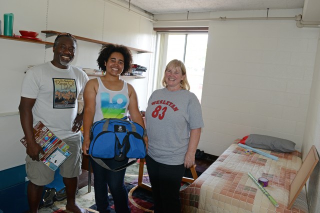 Howard Matthew and Megan Norris '83, chair of the alumni association, helped their daughter, Taylor, move into her new Butterfields residence. Megan made the bed, Taylor was unpacking her clothes and Howard's job was to hang items on the walls.