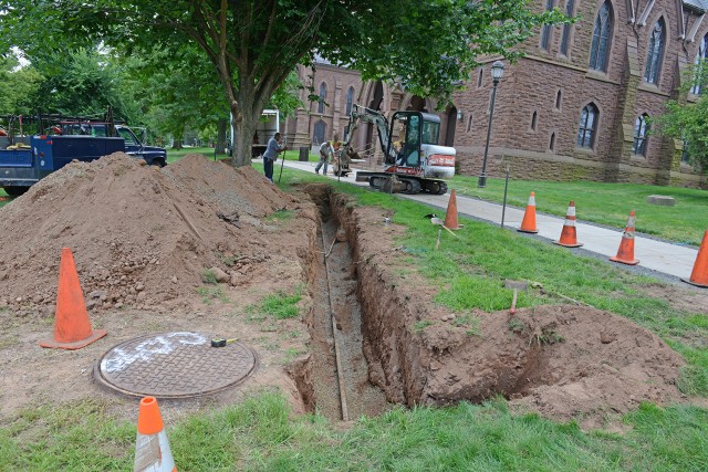 As part of Wesleyan's major maintenance projects this summer, Physical Plant- Facilities staff and local contractors inspected the manholes and made repairs to an underground piping system. On Aug. 7, crews discovered a failed drain line, which may be the cause of leaking vapors, visible during the colder months.