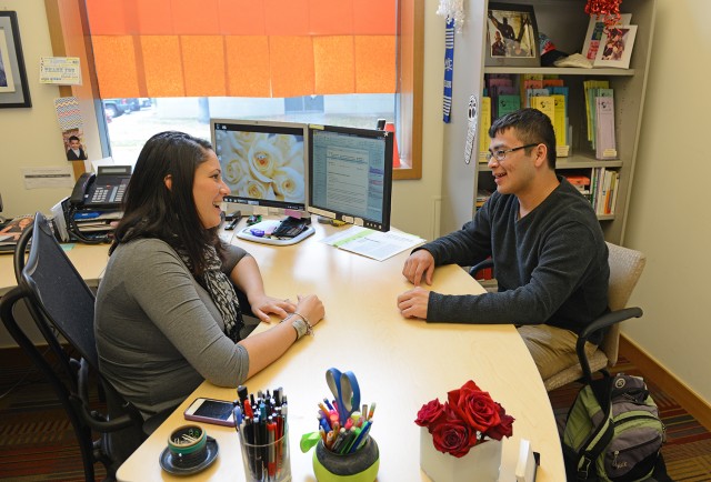 New Connections Mentoring Program Mentor Elisa Cardona, director of student activities and leadership development, speaks with her mentee, Eric Zepeda '17 on Oct. 16. Zepeda comes to Wesleyan from San Francisco, Calif.