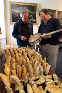 Stuart Frank '70 and photographer Richard Donnelly examine a whale bone banjo which was displayed earlier this year at the New Bedford Whaling Musuem.