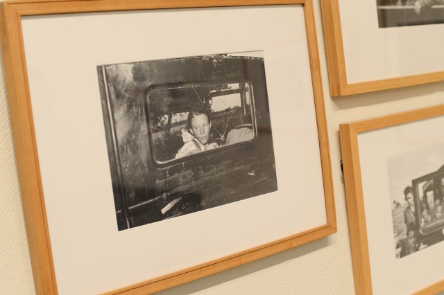 On display is Russell Lee's  (American, 1903-1986) gelatin silver print of "Migrant Child in a Car, Prague, Oklahoma, 1939."