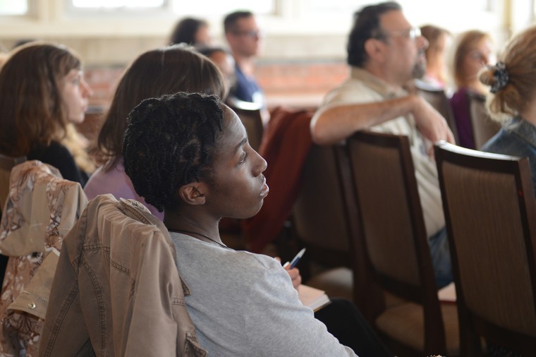 Conference participants enjoy Robinson's lecture.