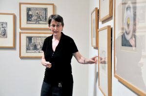 Clare Rogan, curator at the Davison Art Center, leads a gallery talk.